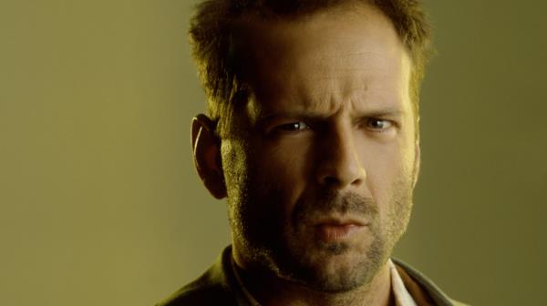 Bruce Willis frowns